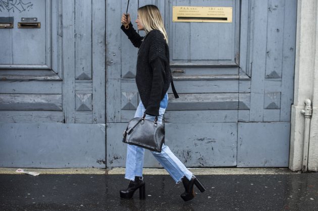 Street styler Celine Aagaard sported her step-hem jeans with black platform ankle boots