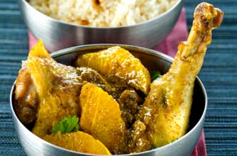 Chicken in curry and orange sauce