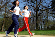 Two women jogging outdoors