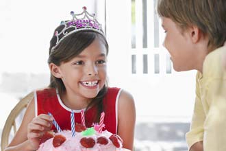 Birthday girl with her cake