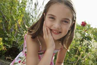 Happy girl in a garden