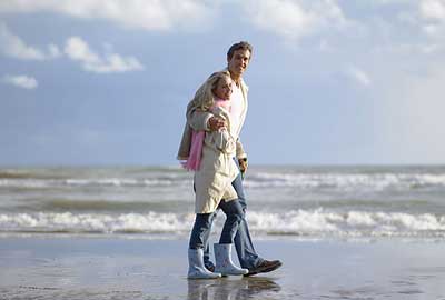 Couple walking on a beach