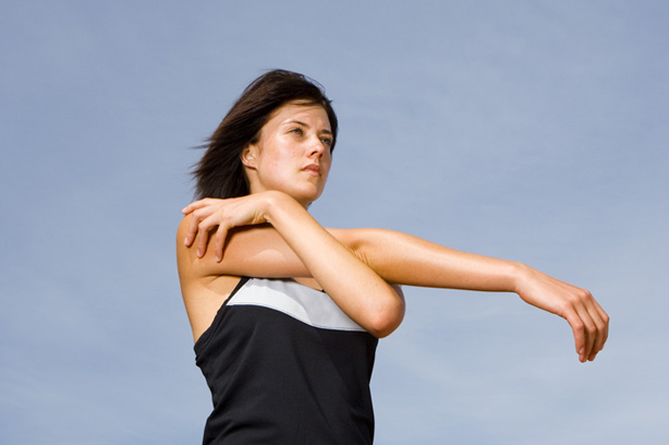 A woman stretching herr arm