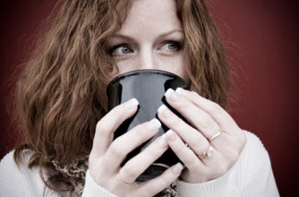 Woman with cup of tea