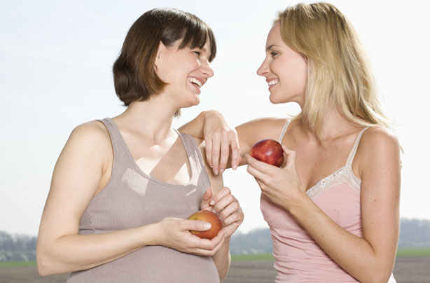 Pregnant woman with friend