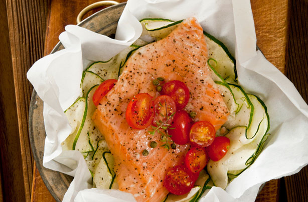 Salmon, courgette and plum tomato parcels