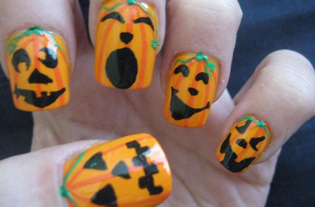 Pumpkin face Halloween nails