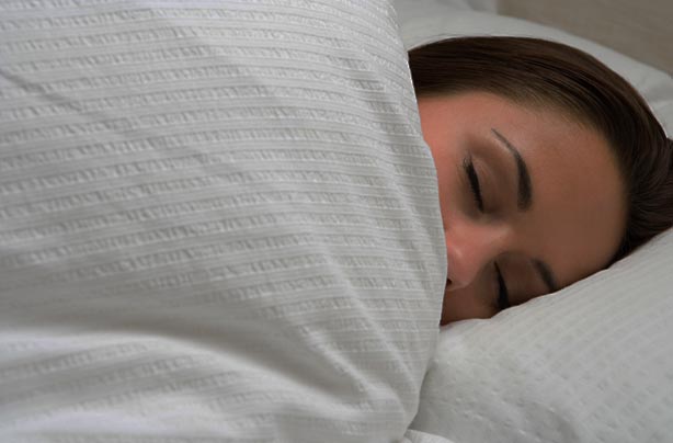 Woman asleep in bed