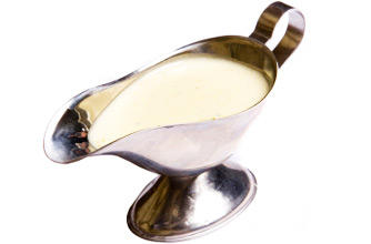 White sauce in a gravy boat