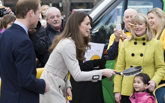 Kate Middleton and Prince William toss pancakes in Northern Ireland