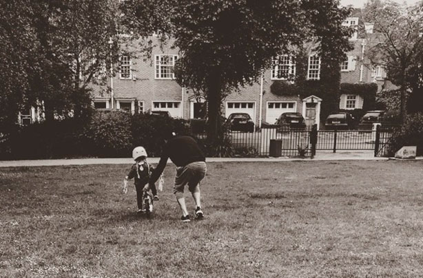 Harper Beckham learns to ride a bike