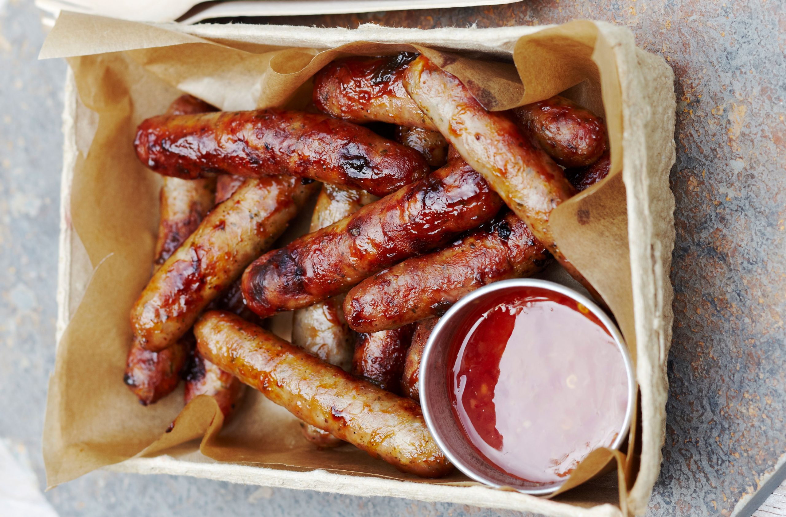 Sticky sausages and sweet chilli dip