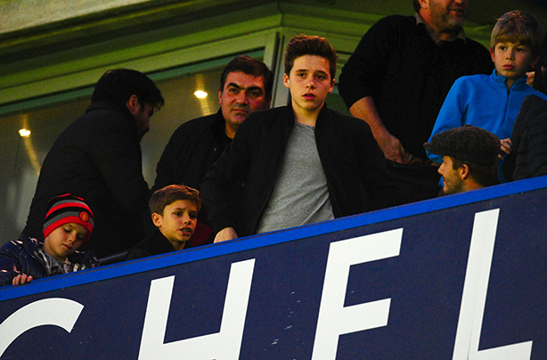David Beckham watching Manchester United with sons