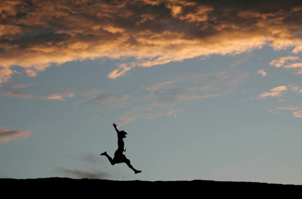 Woman jumping for joy