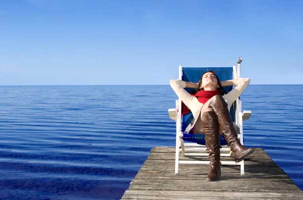 woman relaxing in deck chair