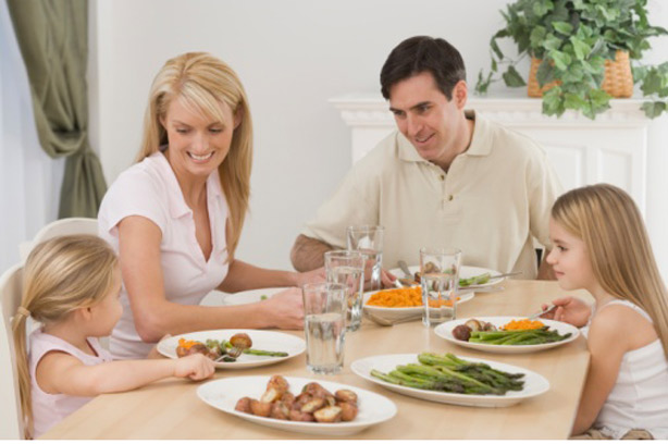 share mealtimes together family eating dinner