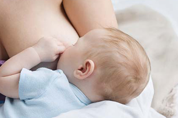 Breastfeeding guide woman newborn baby