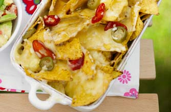 Essentials magazine, loaded nachos with chunky guacamole