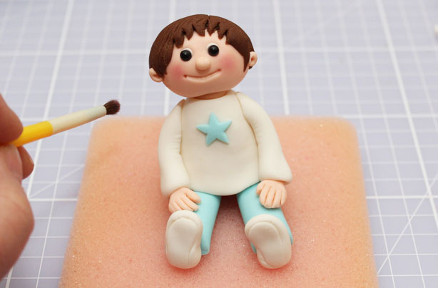 Boy cake topper