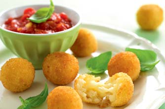 Arancini rice balls with tomato sauce