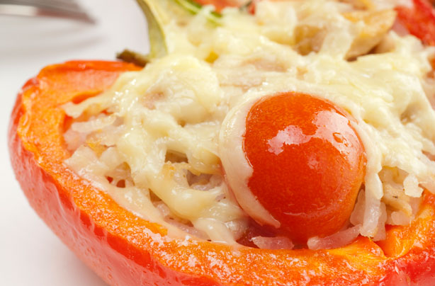Stuffed red peppers with cherry tomatoes and Cheddar