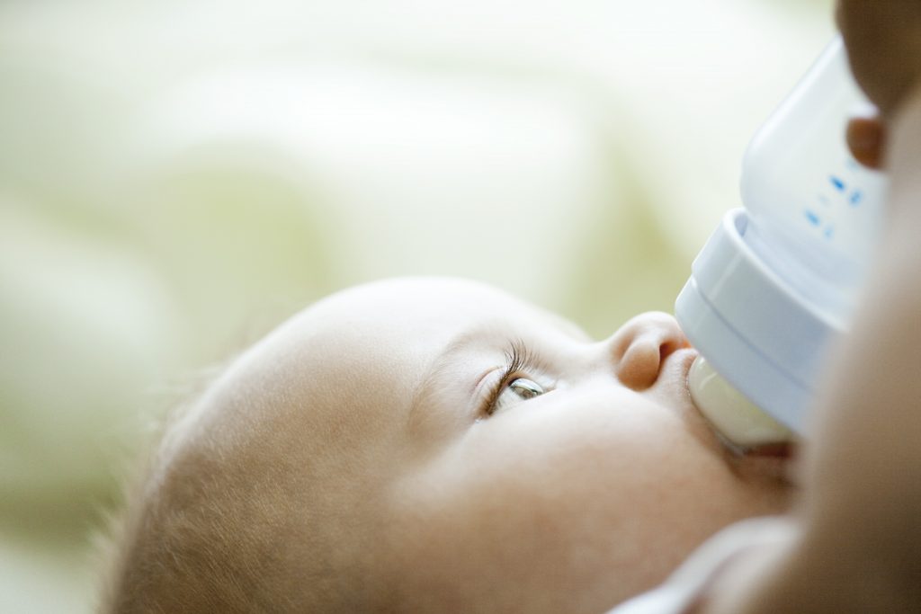 Baby drinking from bottle