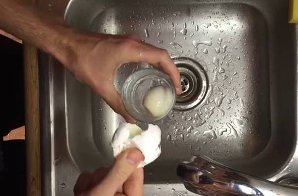 How to peel a hardboiled egg in a glass of water