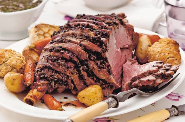 Herb roasted leg of lamb with mustard dumplings