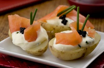Salmon and caviar-topped potatoes