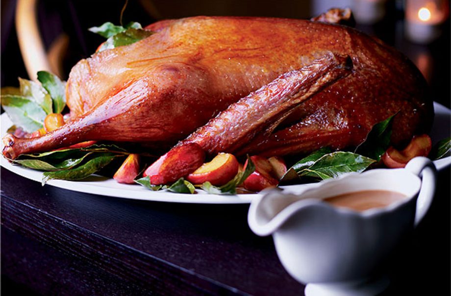 Roast goose with apple and bay leaves