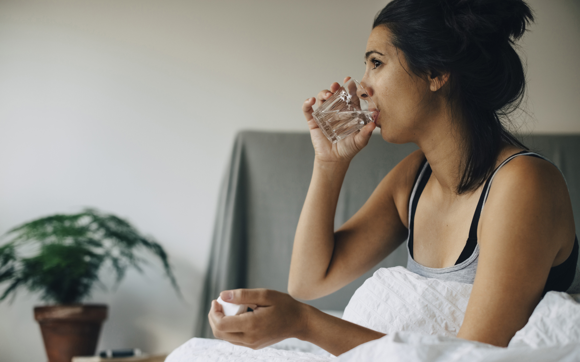 woman drinking water: worst alcohol