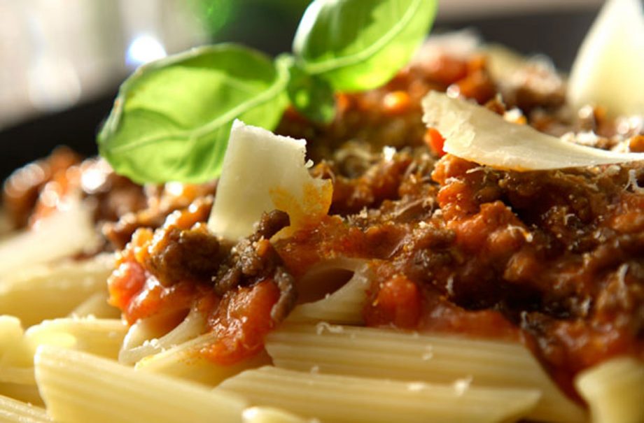 Penne Bolognese with cubetti di pancetta