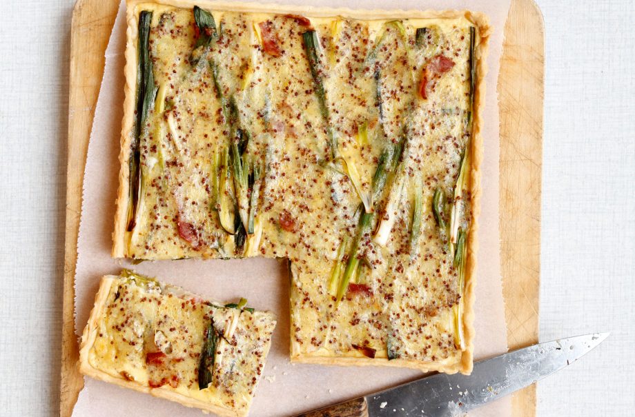 Smoky cheese, bacon, baby leek and potato tart