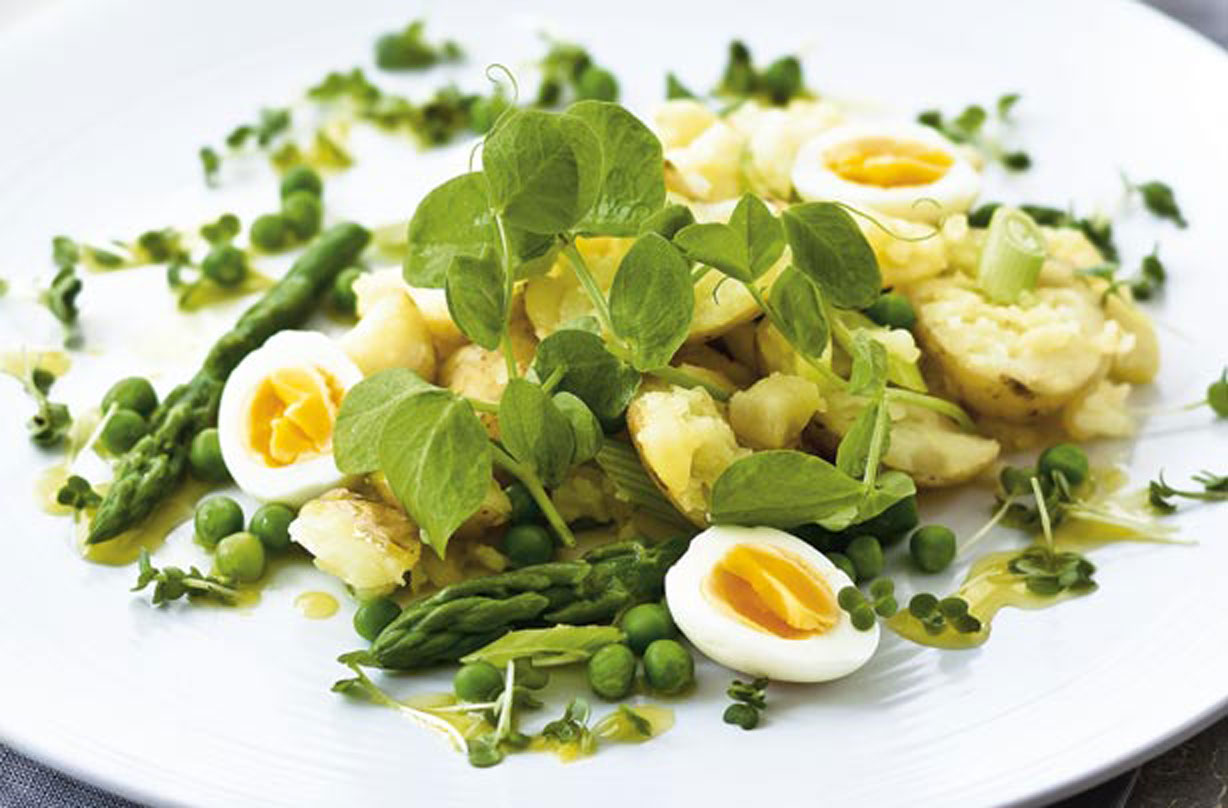 Crushed new potatoes and shoots