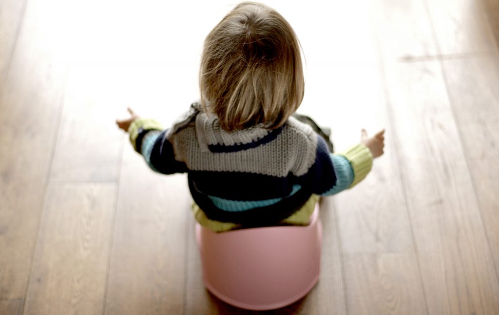 child on potty