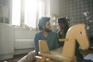 smiling couple excited about having a boy or a girl