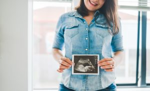 woman holding ultra sound