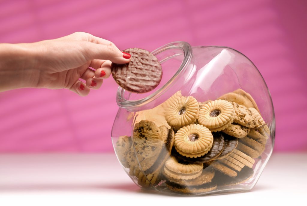 The real reasons you gain weight on your period: hitting the biscuit jar is tempting at this time