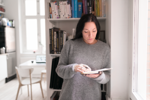 woman checking ovulation calendar