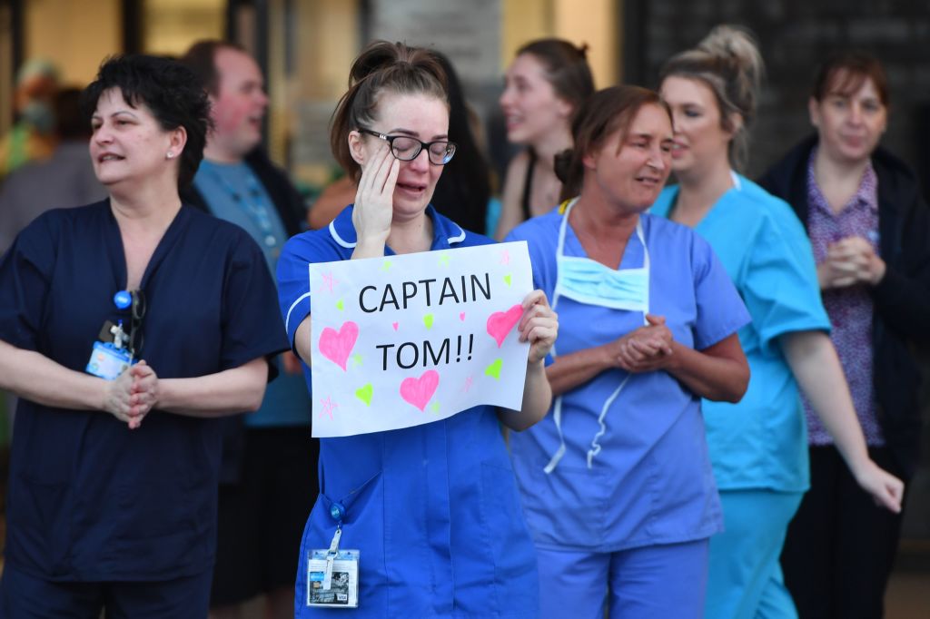 Nurse cries while celebrated Tom Moore who is due to be knighted