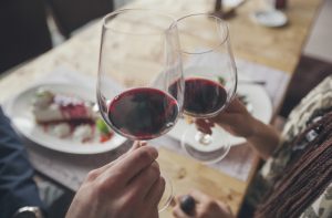 Couple enjoying dinner with wine