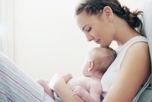 mum holding baby