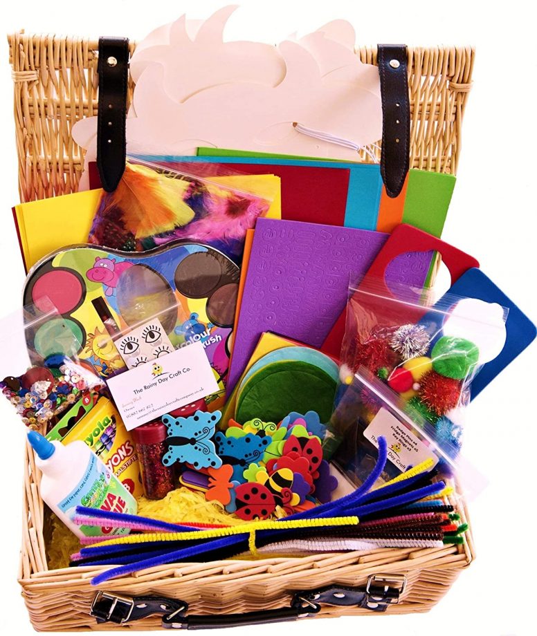Wicker basket full of colourful paper and craft toys for seven year olds