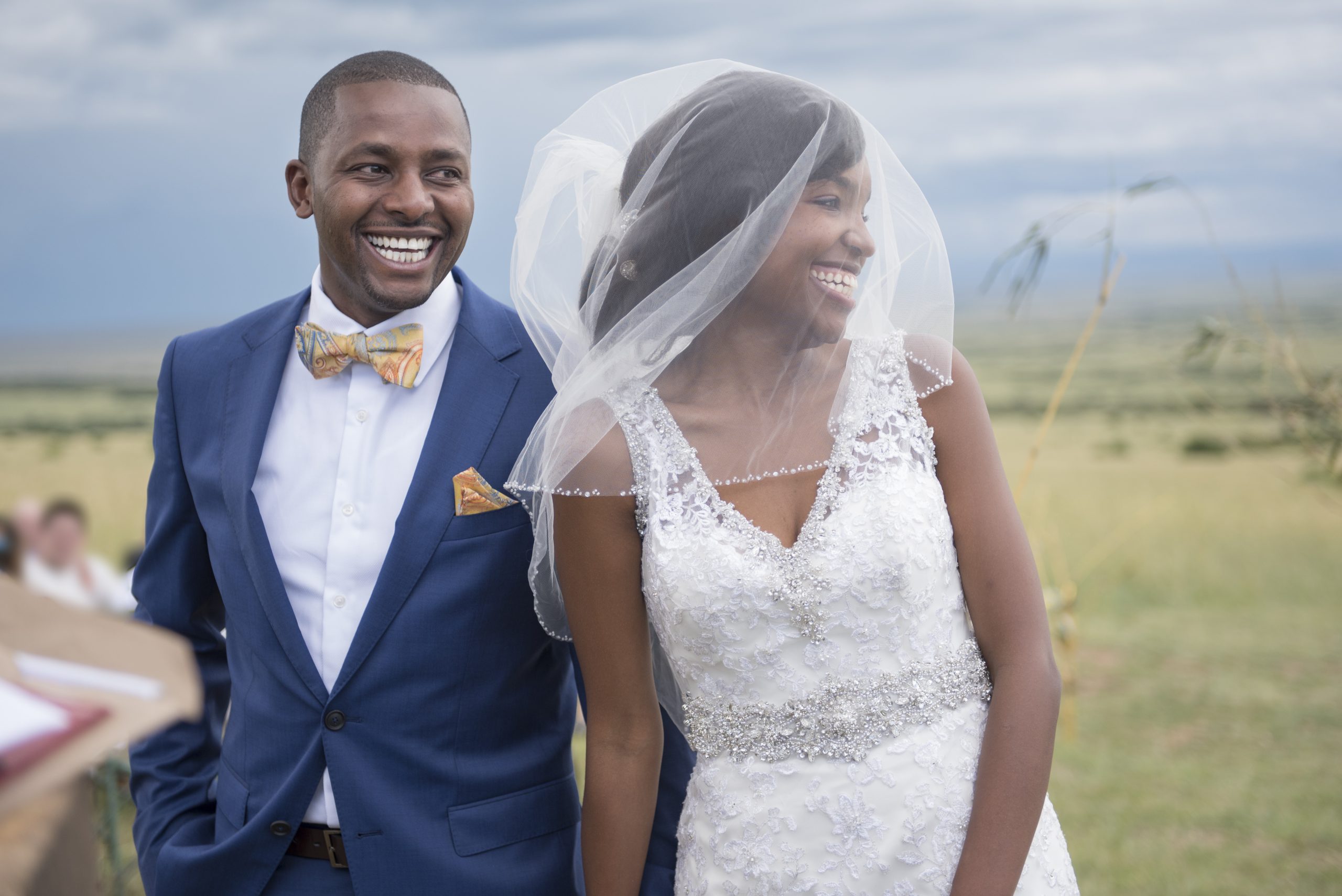 two people getting married outside