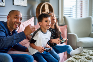 family playing with Nintendo Switch game