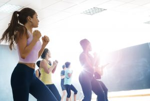 women in an exercise class under new tier 1 system of lockdown