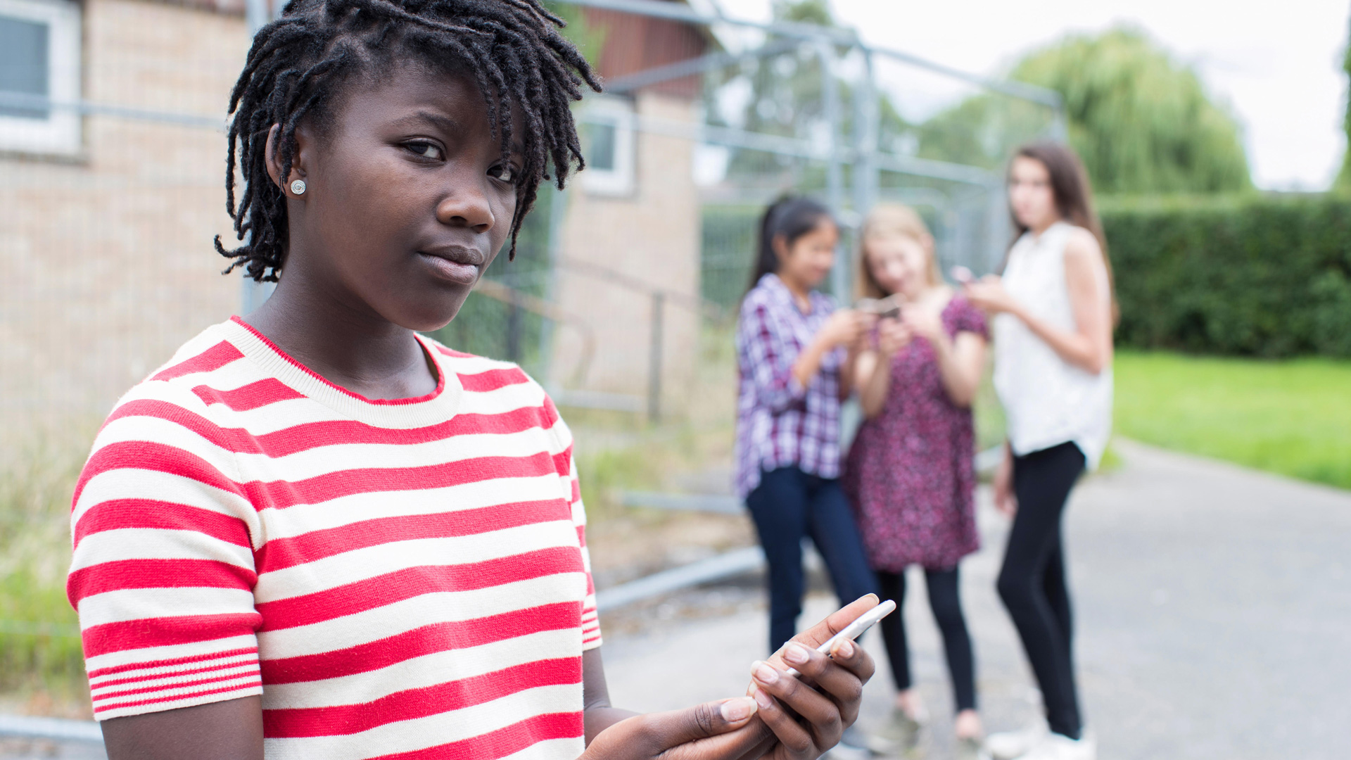A image showing different types of bullying with cyberbullying and exclusion