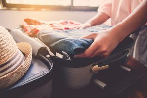 Tourists are packing luggage for travel