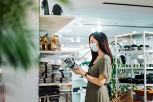 woman shopping in homeware store after lockdown ends on December 2