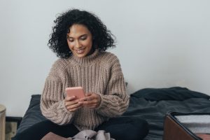 woman researching 'can I travel abroad during the UK lockdown?'